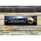 Nameplate with doorbell