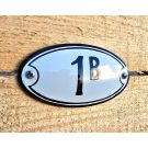 House number oval with frame and colored edge