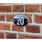 House number oval with frame and colored edge