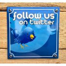 Follow us on Twitter enamel sign