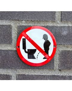 Forbidden to urinate next to the toilet seat prohibition sign