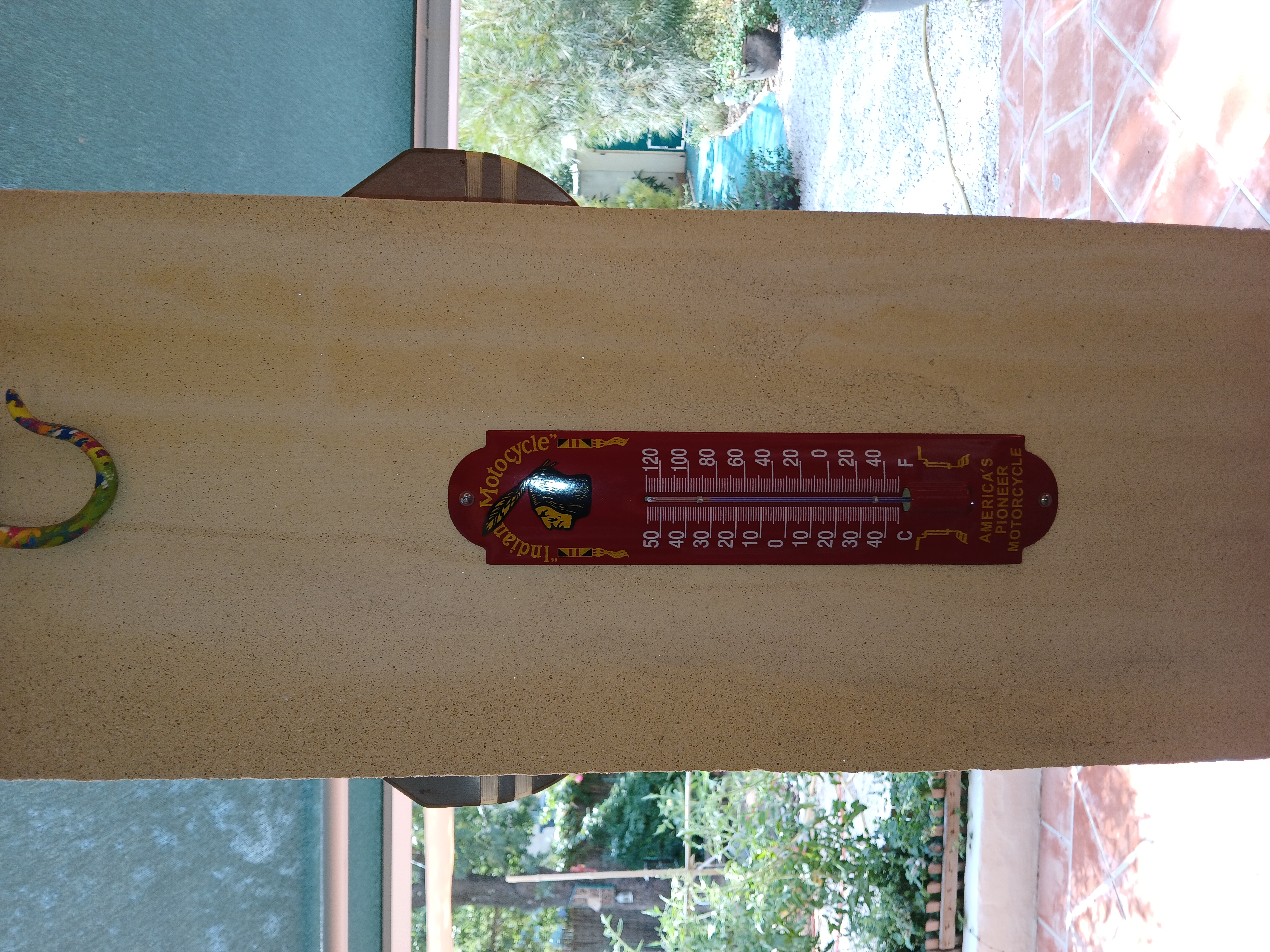 Indian red enamel thermometer